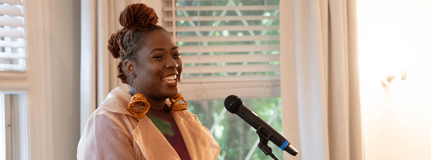 Current Poet Laureate Lady Brion speaking at the Clifton House in Baltimore. 